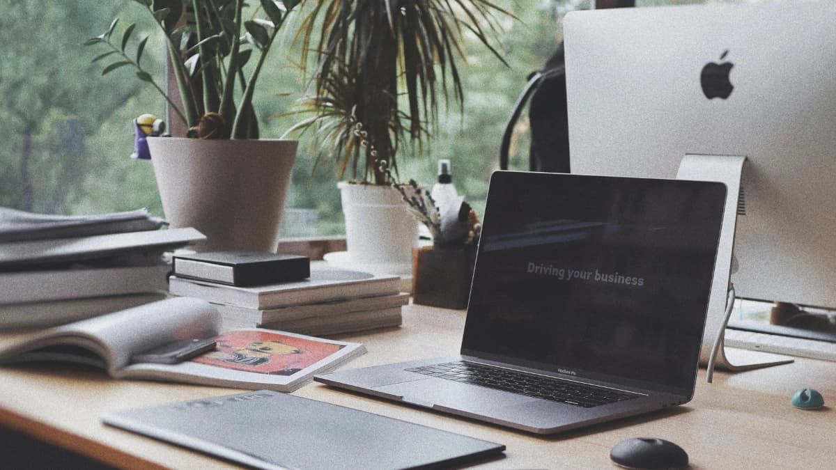 Professional web design services in Fort Wayne showing a small business website mockup with local city background